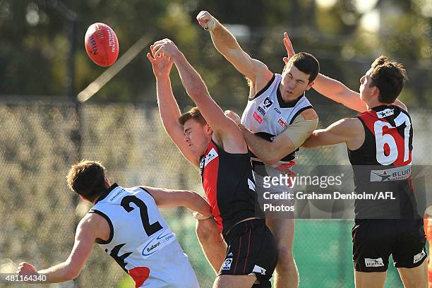 Jordan Schroder of the Bombers contests the ball in the air during the round 14 VFL match between the Essendon Bombers and North Ballarat at Windy...