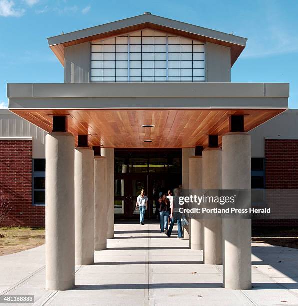 Staff Photo by Gordon Chibroski, Tuesday, October 28, 2003: Students head back inside through this front entrance area after an outdoor PE class at...