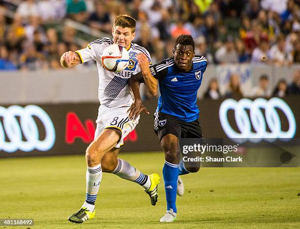 Steven Gerrard of Los Angeles Galaxy battles Fatai Alashe of San Jose Earthquakes during Los Angeles Galaxy's MLS match against San Jose Earthquakes...