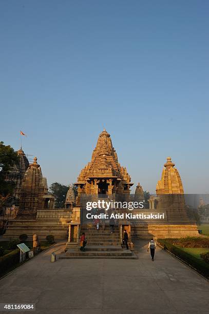 Tourist sightseeing the Lakshmana Temple, one of the Khajuraho group of monuments, a part of UNESCO World Heritage Sites at Khajuraho.