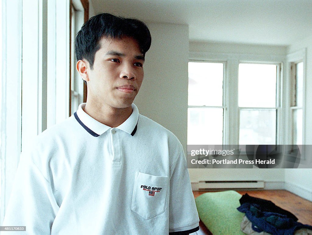 Seiha Srey talks while in an apartment on Munjoy Hill he is working on.