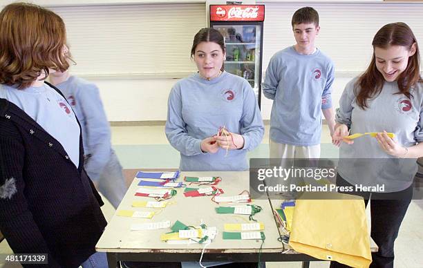 Staff Photo by Jack Milton, Tuesday, January 29, 2002: Windham High School Latin Club's Alyse Bowers, Julia Bruno, Steve Parker, and Justine Twofoot...