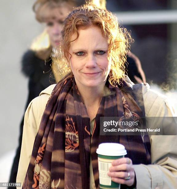 Staff Photo by Gordon Chibroski, Thursday, January 16, 2003: Tammy Westbrook, mother of Jeffery "Russ" Gorman, walks to the courthouse to testify at...