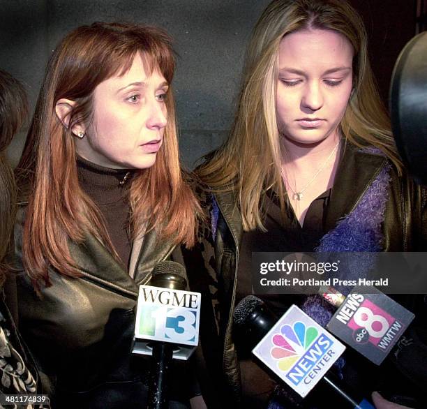 Staff Photo by Doug Jones, Friday, January 17, 2003: Diane Jenkins and Julie St. Laurent, right, mother and sister to murder victim, Amy St. Laurent,...