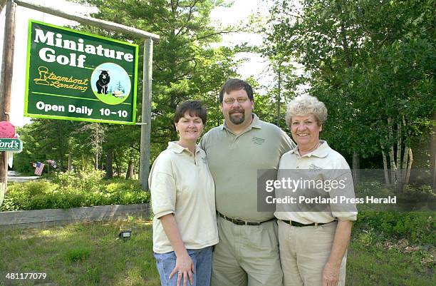 Staff Photo by John Patriquin, Thursday, July 11, 2002: Steamboat Landing Miniature Golf owners Phillippa, Richard and Laurel Cebra at thier Naples...