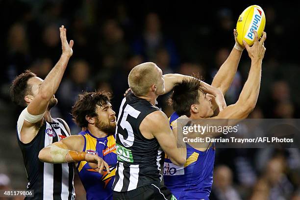 Callum Sinclair of the Eagles marks the ball during the round 16 AFL match between the Collingwood Magpies and the West Coast Eagles at Etihad...