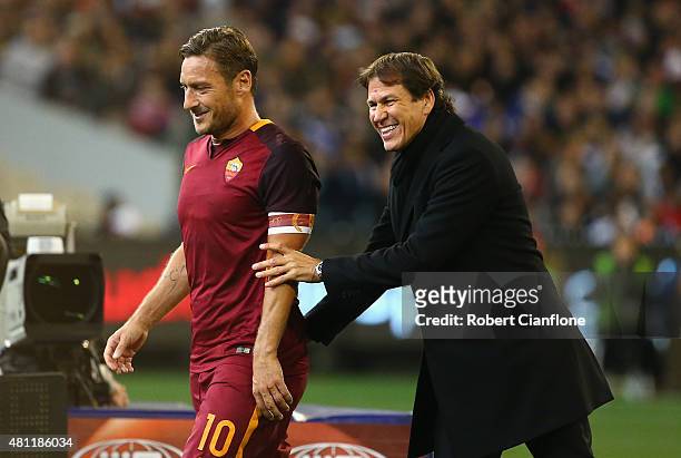 Francesco Totti of AS Roma laughs with AS Roma coach Rudi Garcia after he was substituted during the International Champions Cup friendly match...