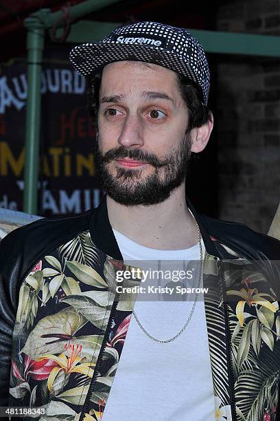 Sylvain Quimene aka Gunther Love attends the Secours Populaire Francais charity party at the Musee Des Arts Forains on March 28, 2014 in Paris,...