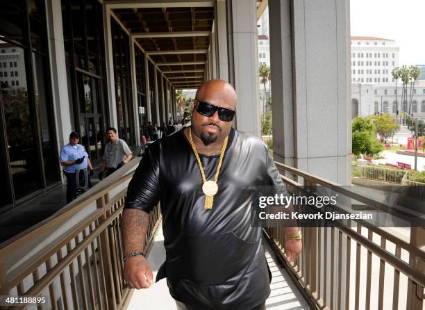 Cee Lo Green, singer and coach on the television show 'The Voice', walks out of Los Angeles Superior Court after a court appearance on March 28, 2014...