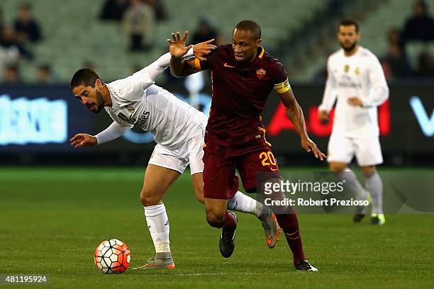 Isco of Real Madrid and Seydou Keita of AS Roma contest the ball during the International Champions Cup friendly match between Real Madrid and AS...