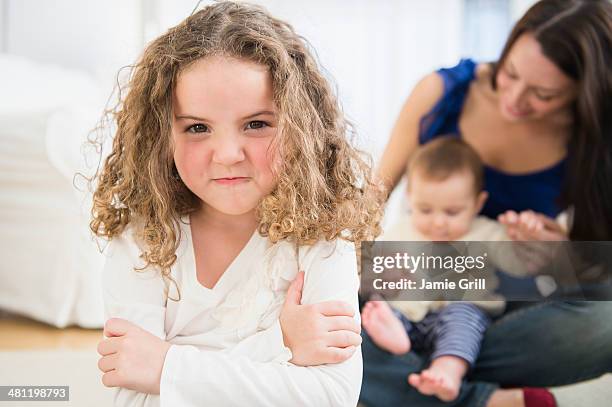 little girl jealous of new baby - covet stock pictures, royalty-free photos & images