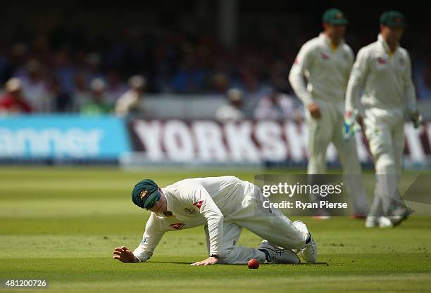 Steve Smith of Australia reacts after dropping Alastair Cook of England during day three of the 2nd Investec Ashes Test match between England and...