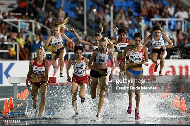 Glynis Sim of Canada and others in action during the Girls 2000 Meters Steeplechase final on day three of the IAAF World Youth Championships, Cali...