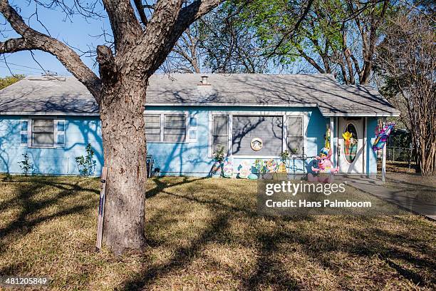 Typical American suburban house, decorated with a giant bunny and eggs for Easter