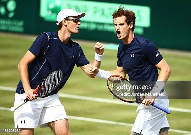 Andy Murray of Great Britain celebrates winning second set tie break with Jamie Murray of Great Britian against Nicolas Mahut and Jo-Wilfried Tsonga...