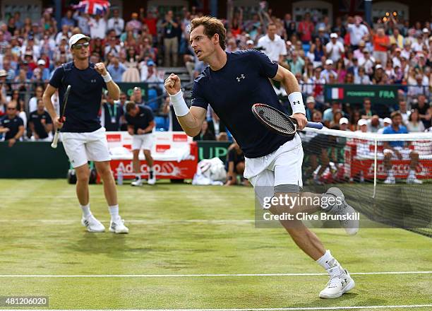 Jamie Murray and Andy Murray of Great Britain celebrate in their match against Nicolas Mahut and Jo-Wilfried Tsonga of France during Day Two of the...