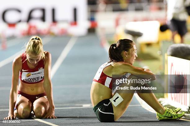 Rylee Bowen of the USA and Lili Toth of Hungary react after the Girls 2000 Meters Steeplechase final on day three of the IAAF World Youth...