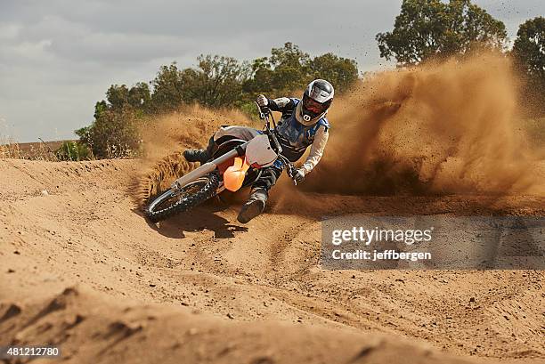 the track is where he thrives - dirt bike stock pictures, royalty-free photos & images