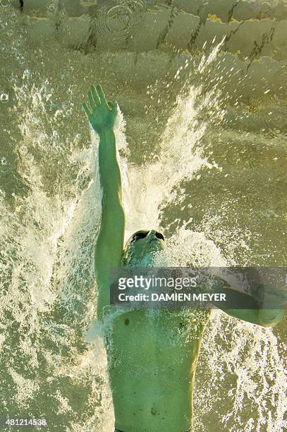 This picture taken with an underwater camera shows Henrique Rodriguez of Brazil competing in the men's 200m individual medley preliminary at the Pan...