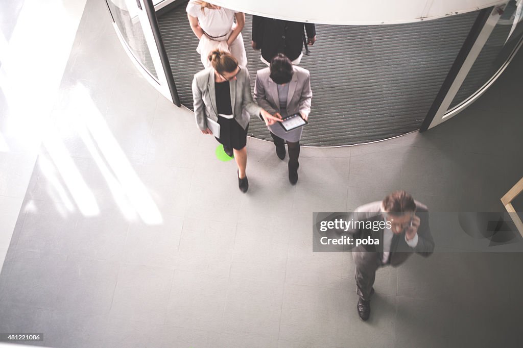 Group of successful businesspeople walking