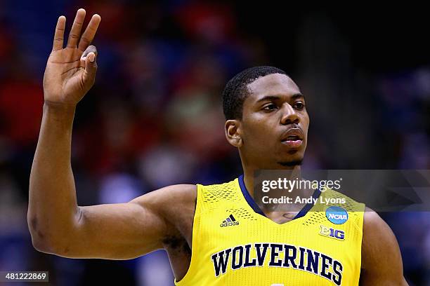 Glenn Robinson III of the Michigan Wolverines celebrates a three pointer in the first half against the Tennessee Volunteers during the regional...