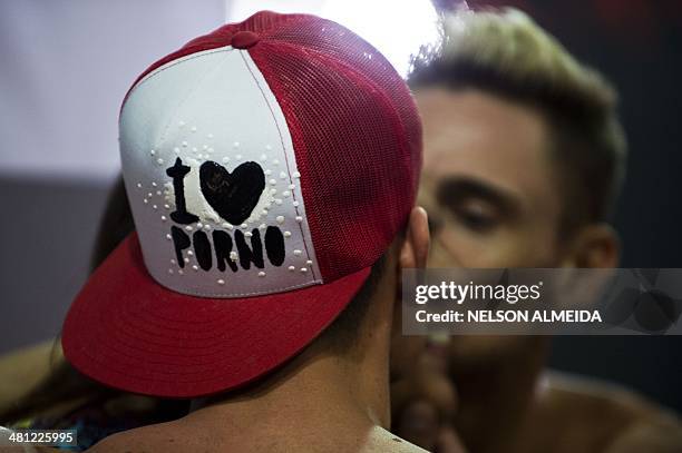 Visitors participate in the Erotika Fair in Sao Paulo, Brazil, on March 28, 2014. The event, the biggest of its kind in Latin America, offers...