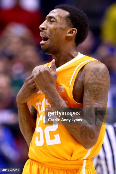 Jordan McRae of the Tennessee Volunteers reacts after turnover in the second half against the Michigan Wolverines during the regional semifinal of...