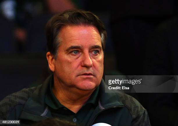 Steve Mariucci looks on during the regional semifinal of the 2014 NCAA Men's Basketball Tournament between the Michigan State Spartans and the...