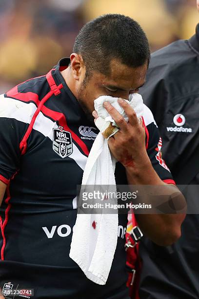 Jerome Ropati of the Warriors leaves the field injured during the round four NRL match between the New Zealand Warriors and the Wests Tigers at...