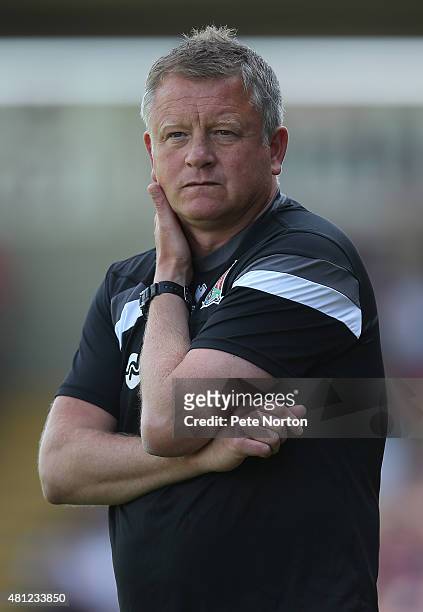 Northampton Town manager Chris Wilder looks on during the Pre-Season Friendly match between Northampton Town and Derby County at Sixfields Stadium on...
