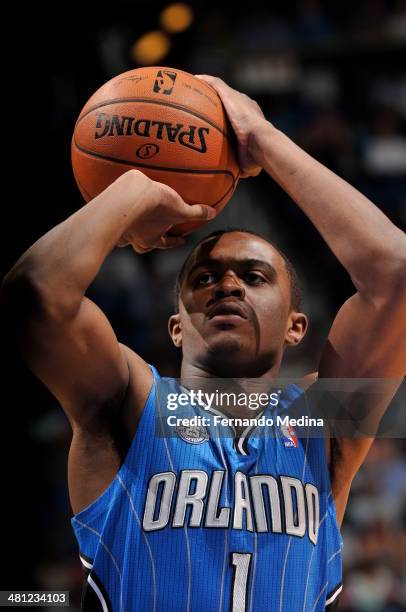 Doron Lamb of the Orlando Magic shoots a foul shot against the Charlotte Bobcats during the game on March 28, 2014 at Amway Center in Orlando,...