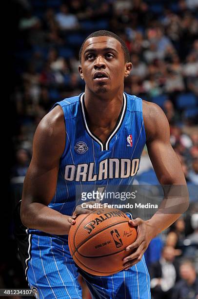 Doron Lamb of the Orlando Magic shoots a foul shot against the Charlotte Bobcats during the game on March 28, 2014 at Amway Center in Orlando,...