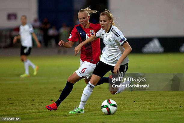 Laura Freigang of Germany challenges Karina Seavik of Norway during the UEFA Women's Under-19 European Championship group stage match between U19...