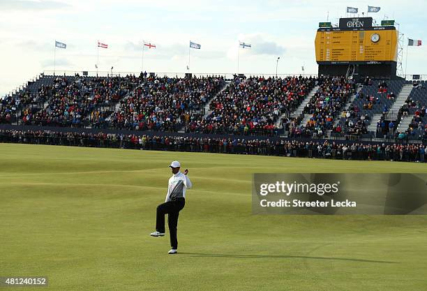 Tiger Woods of the United States reacts on the 18th green during the second round of the 144th Open Championship at The Old Course on July 18, 2015...