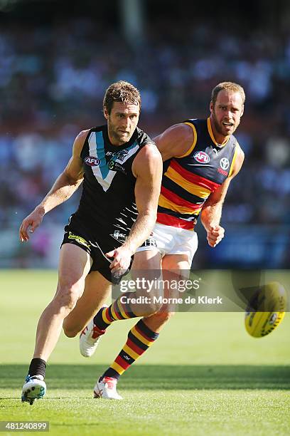 Jay Schulz of the Power competes for the ball with Ben Rutten of the Crows during the round two AFL match between the Port Adelaide Power and the...