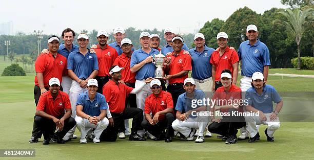 Team Asia and Team Europe celebrate together after the first EurAsia Cup finished in a tie. They are pictured after the single matches on day three...