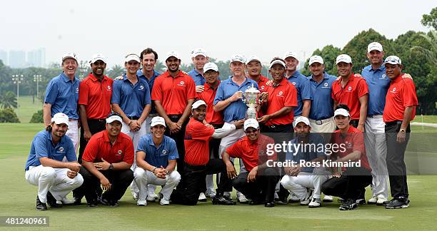 Team Asia and Team Europe celebrate together after the first EurAsia Cup finished in a tie. They are pictured after the single matches on day three...