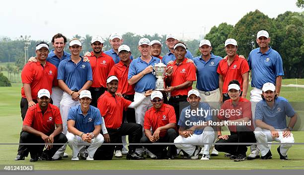 Team Asia and Team Europe celebrate together after the first EurAsia Cup finished in a tie. They are pictured after the single matches on day three...
