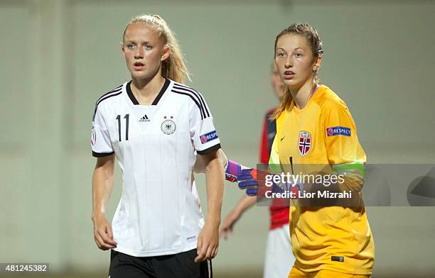 Lea Schuller of Germany and Cecilie Fiskerstrand of Norway are seen during the UEFA Women's Under-19 European Championship group stage match between...