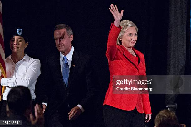 Hillary Clinton, former U.S. Secretary of state and 2016 Democratic presidential candidate, right, and Martin O'Malley, former governor of Maryland...