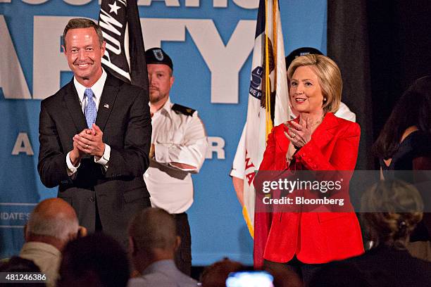 Hillary Clinton, former U.S. Secretary of state and 2016 Democratic presidential candidate, right, and Martin O'Malley, former governor of Maryland...