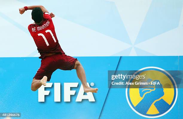 Be of Portugal celebrates his team's fourth goal during the FIFA Beach Soccer World Cup Portugal 2015 Semi-final match between Portugal and Russia at...