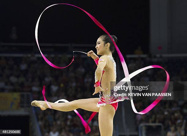 Laura Zeng of the US performs her ribbon rotation in the rythmic gymnastics individual all-around at the Pan American Games July 18, 2015 in Toronto,...