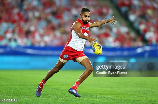 Lewis Jetta of the Swans kicks during the round two AFL match between the Sydney Swans and the Collingwood Magpies at ANZ Stadium on March 29, 2014...