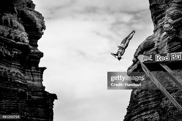 In this handout image provided by Red Bull, Anna Bader of Germany dives from the 20 metre platform during the fifth stop of the Red Bull Cliff Diving...