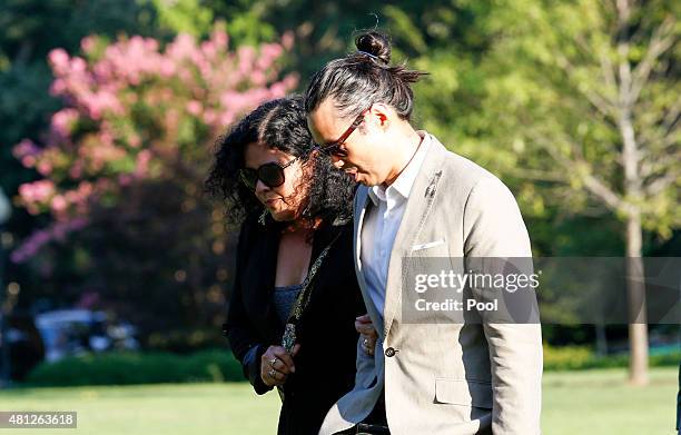 Maya Soetoro-Ng, sister of U.S. President Barack Obama, and her husband Konrad Ng return to the White House after a two-day trip to New York City...