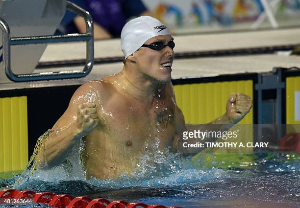 Henrique Rodrigues of Brazil wins gold during the men's 200m Individual Medley Finals at the Toronto 2015 Pan American Games in Toronto, Canada July...