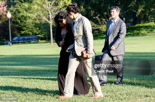 Maya Soetoro-Ng, sister of U.S. President Barack Obama, and her husband Konrad Ng return to the White House after a two-day trip to New York City...