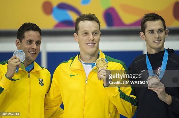 Gold medalist Henrique Rodrigues of Brazil poses with silver medalsit Thiago Pereira of Brazil and bronze medalist Joseph Bentz of USA after...