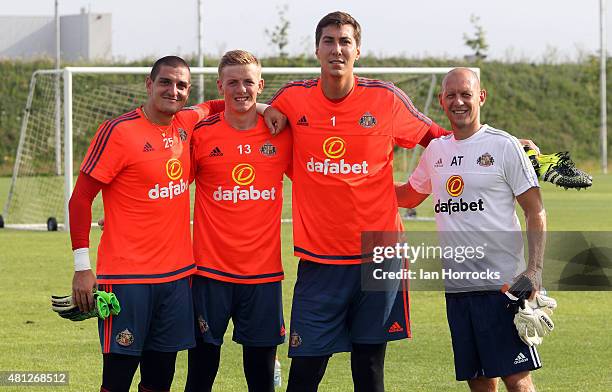 Sunderland goal-keeping team L-R Jordan Pickford, Vito Mannone, Costel Pantilimon and coach Adrian Tucker during a Sunderland AFC training session on...
